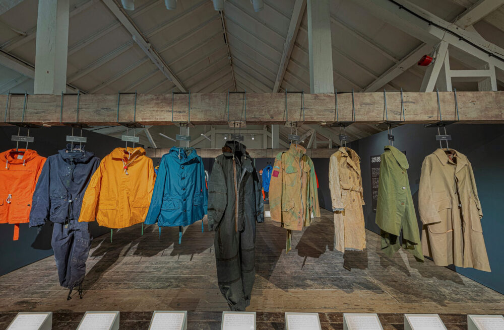 Crop from a 360 image showing some of the exhibits at the Belstaff 100 years exhibition virtual tour. This images shows some of the clothing made for the British Navy and RAF to use in extreme conditions.