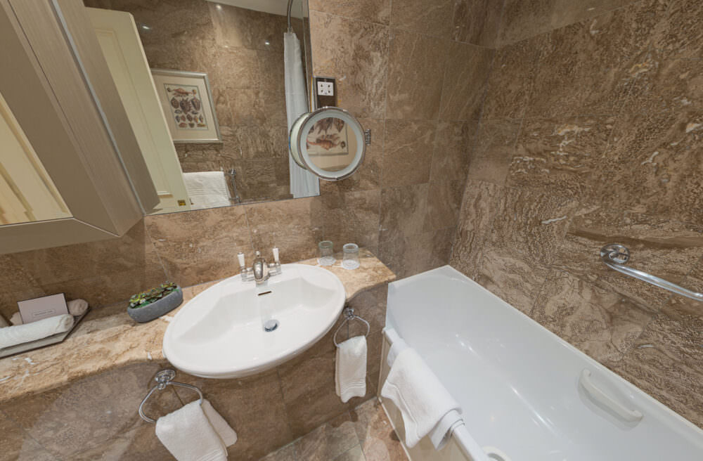 Stairwell image taken from the apartment virtual tours for 47 Park Street. This shows a bathroom with sink and bath visible.