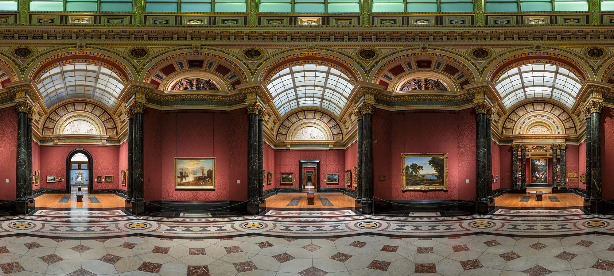 Gallery 360 - Room 36 at the National Gallery - The Imaginarium. The image is a flattened version of a spherical panorama. It shows Room 360 which is a centreal room with galleries off each of the three doorways visible in the image. It is a grand room with deep red wallpaper and art adorning the walls.